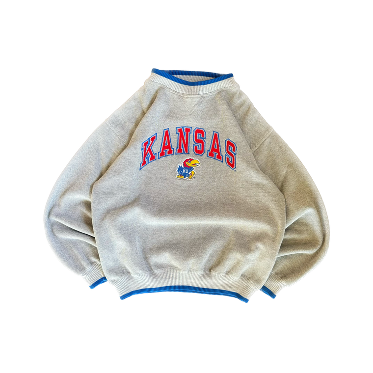 WESTSIDE STOREY VINTAGE | VINTAGE 90S LOGO ATHLETIC SPECKLE GRAY KANSAS JAYHAWKS SWEATSHIRT - GRAY