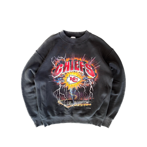 WESTSIDE STOREY VINTAGE | VINTAGE 90'S KC CHIEFS RIDING THE STORM SWEATSHIRT - BLACK - Westside Storey